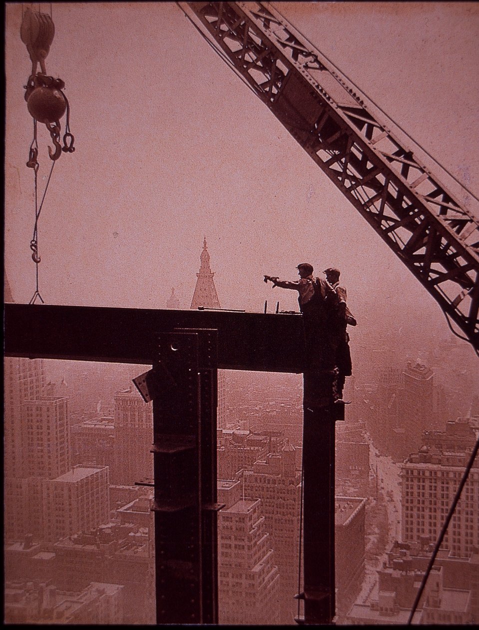 Empire State Building under construction, showing placing of steel girder by Lewis Wickes Hine
