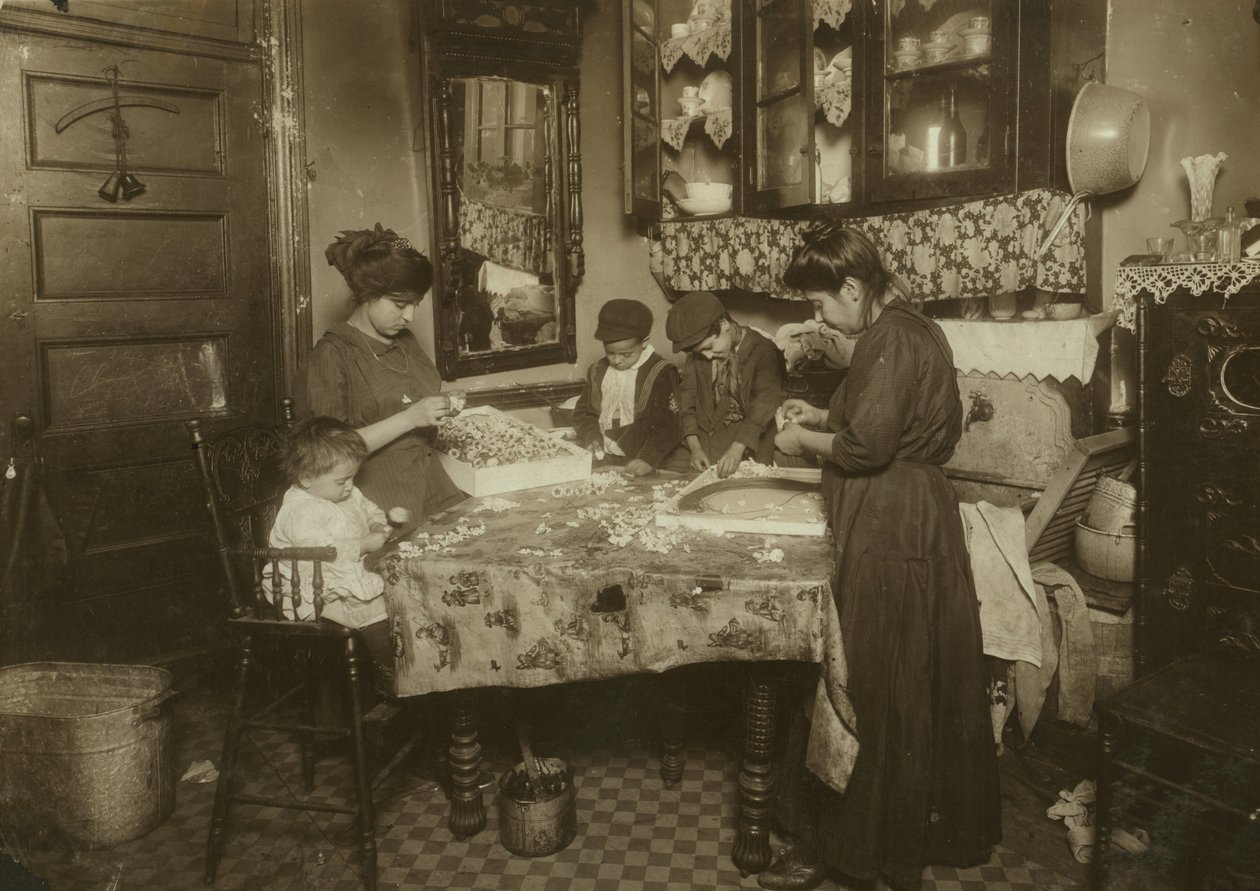 Mrs. Mette and Her Children Making Flowers in a Dirty New York Tenement, 1911 by Lewis Wickes Hine