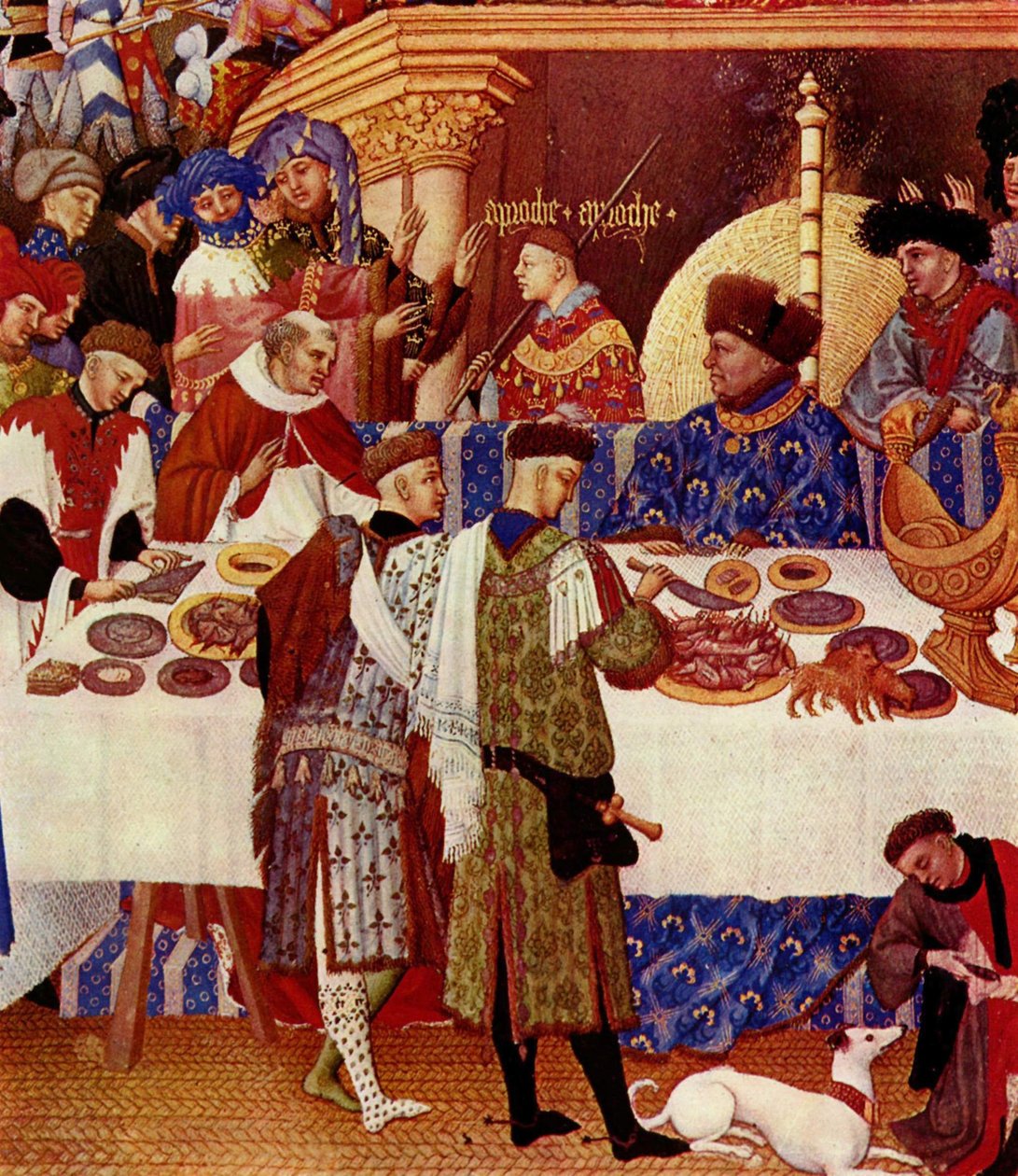 The Duke of Berry, Seated at the Bottom Right, Back to the Fire, Dressed in Blue and Wearing a Fur Cap by Limbourg Brothers