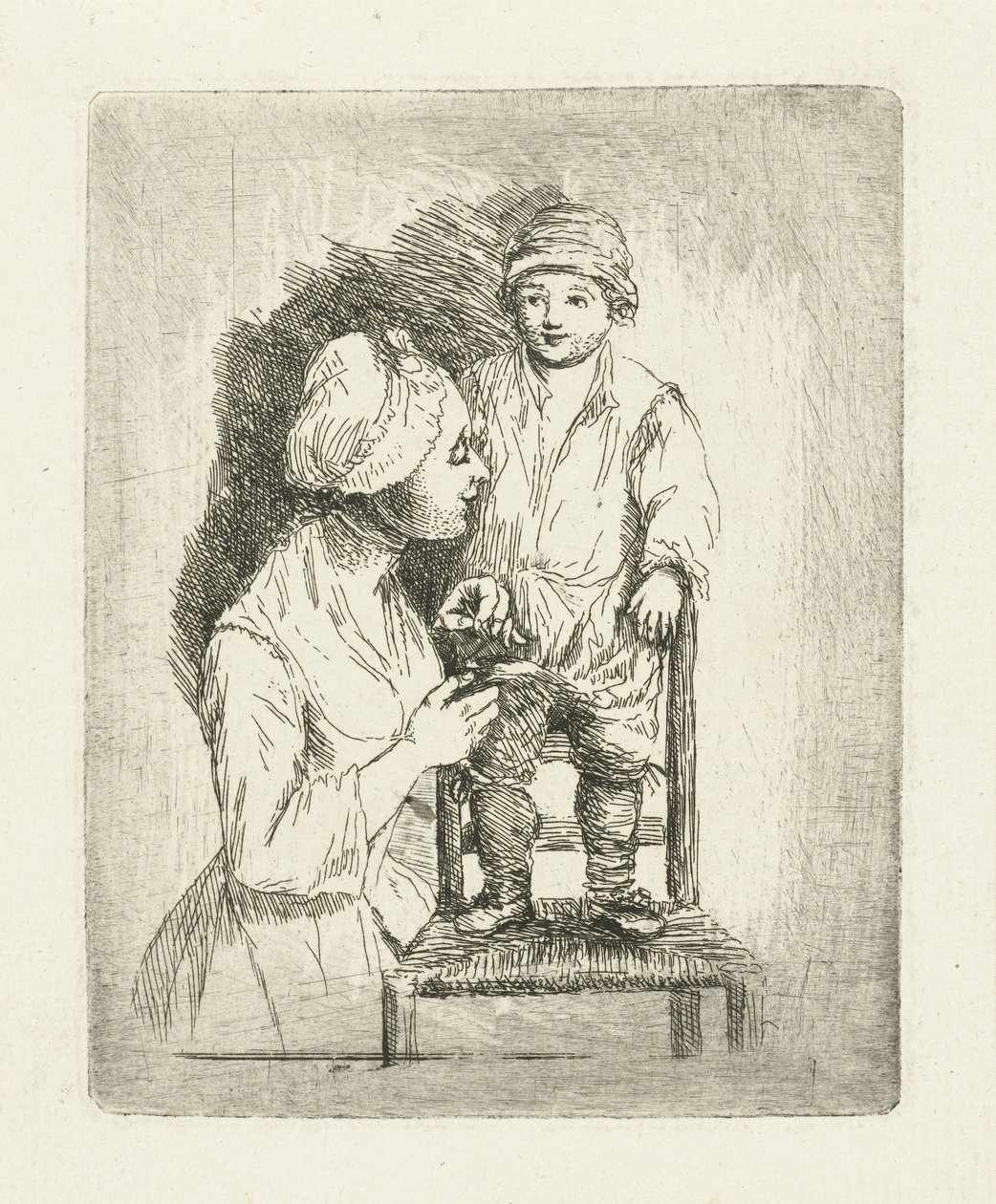 A Mother Sewing a Button on Her Son