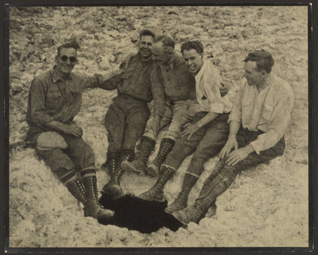 Group Portrait Seated at Mouth of Vertical Cave, San Jacinto Peak by Louis Fleckenstein