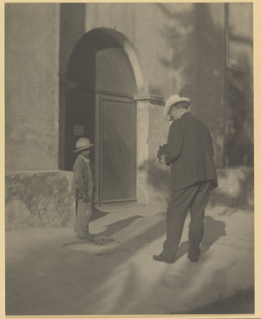 Man Photographing Poor Child by Louis Fleckenstein