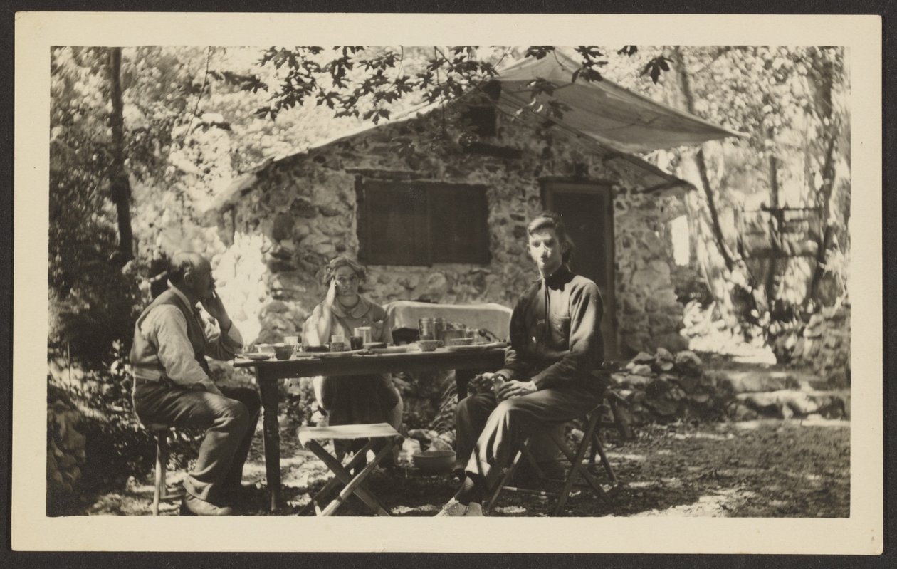 Outdoor Meal at Stone House in Woods by Louis Fleckenstein