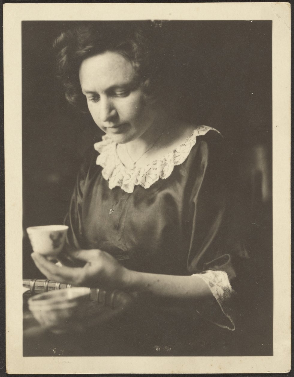Woman with Tea Cup by Louis Fleckenstein