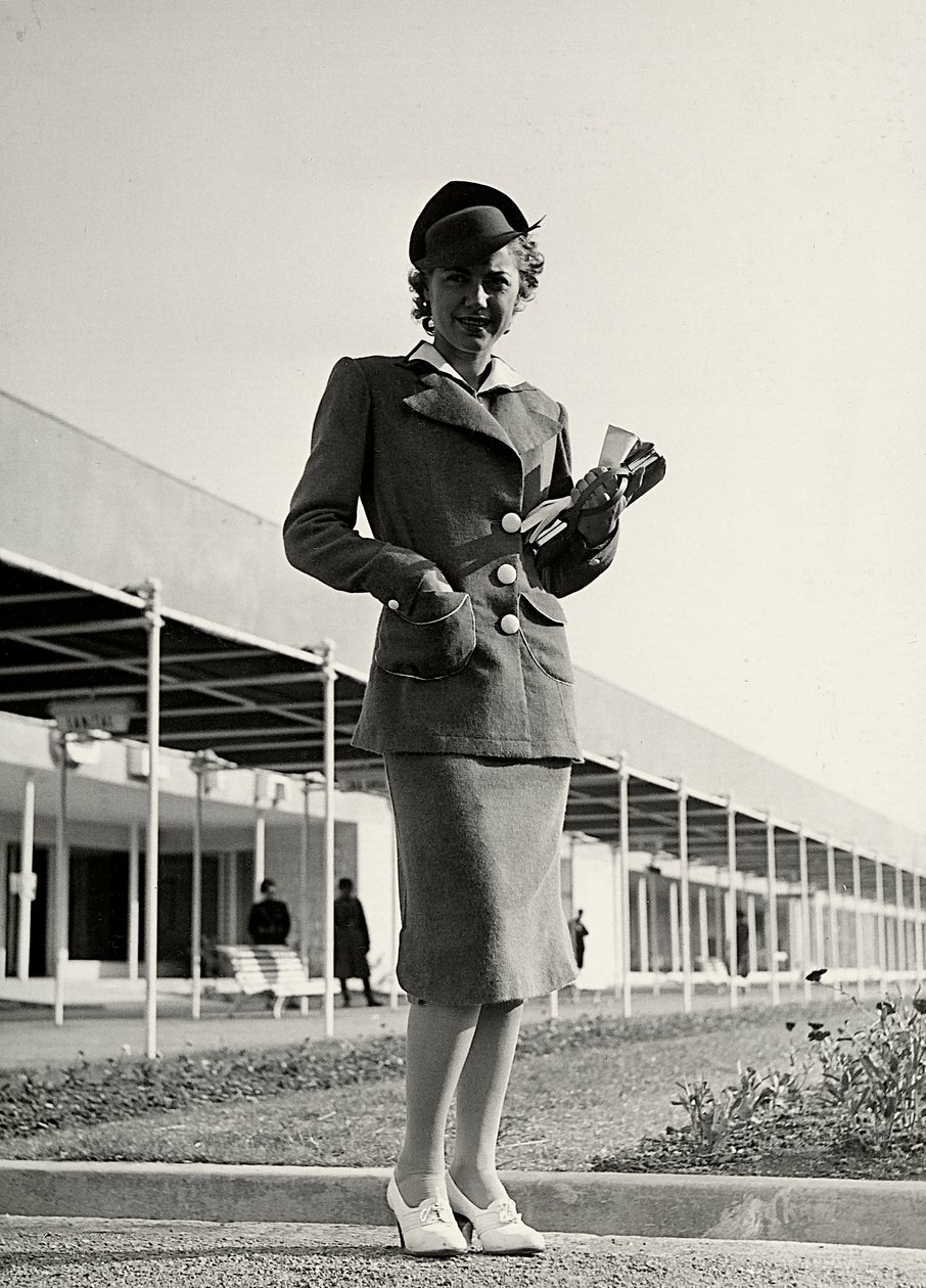 Model in a suit created by the couture house Graldi by Luis Bogino
