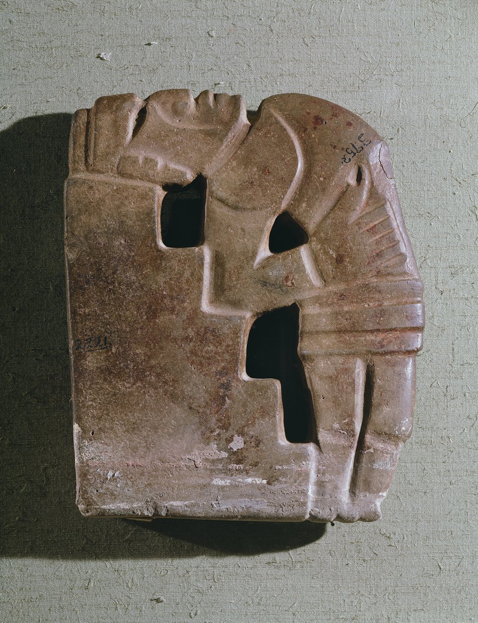 Man in a sacrificial position against a step, Classic period, 250-950 AD by Mayan