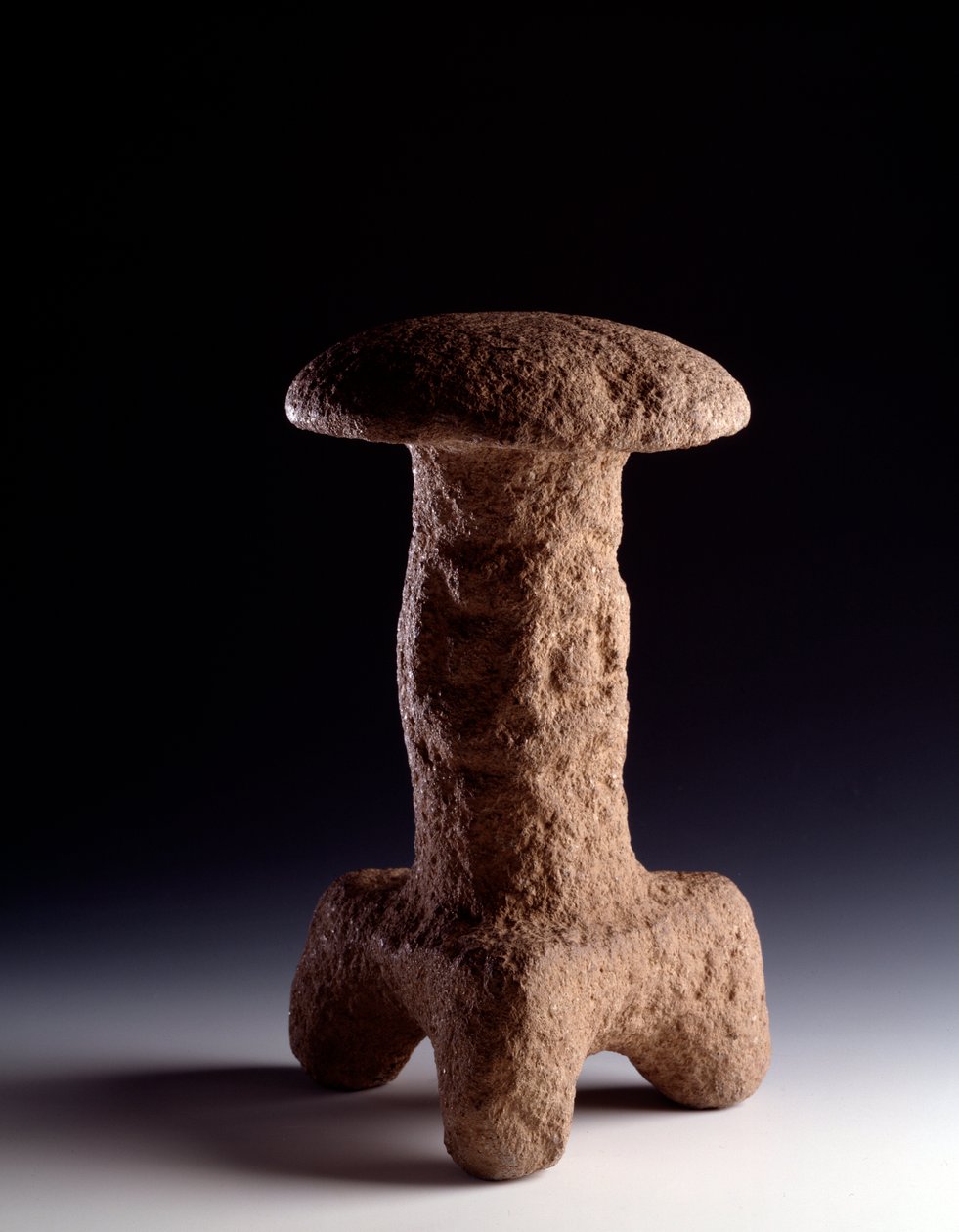 Stone sculpture in the form of a tripod fungus by Mayan Mayan
