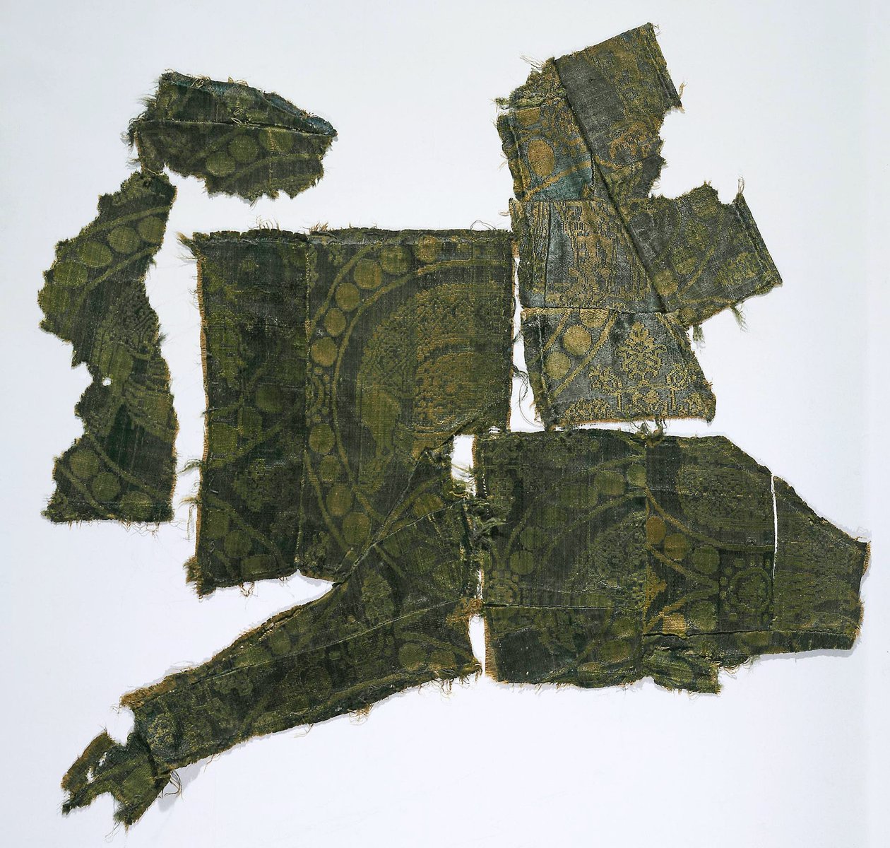 Fragments of a Caftan Covered with a Silk Fabric with a Senmurv Pattern, Moshchevaya Balka Burial by Medieval Culture of the North Caucasian
