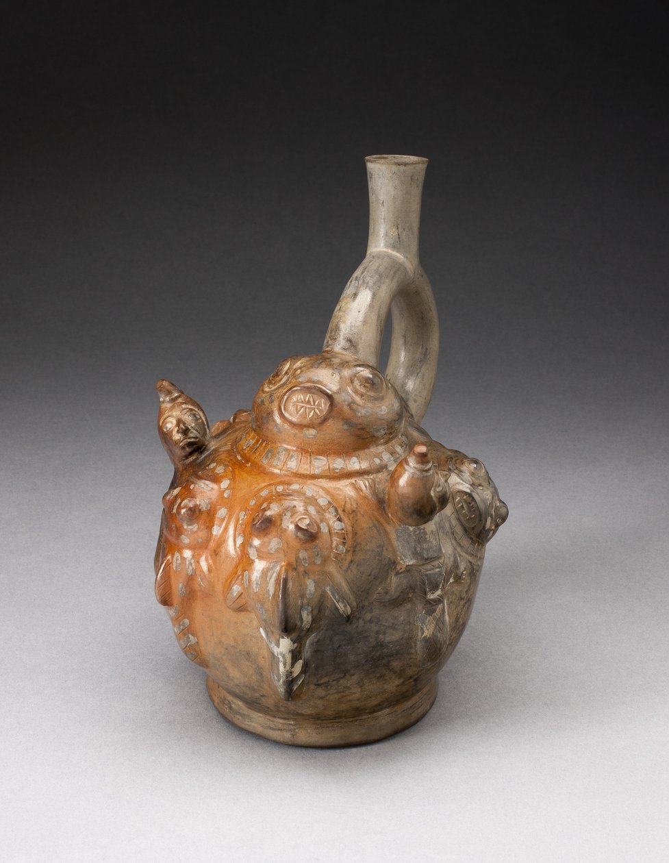 Stirrup Spout Vessel with Relief Depicting a Fishing Scene by Moche