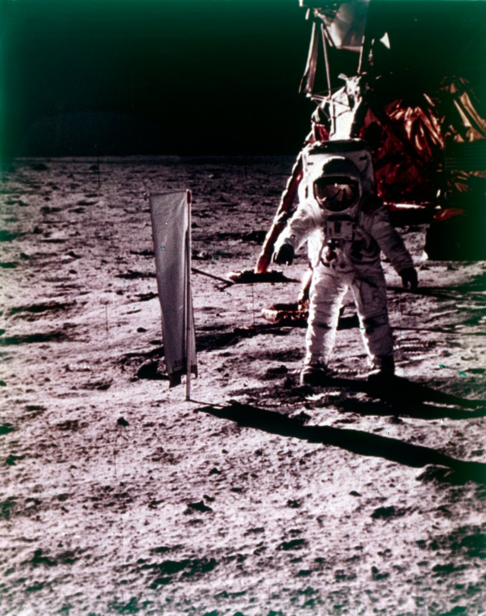 Buzz Aldrin Deploys Solar Wind Collector on the Surface of the Moon, Apollo 11 Mission, July 1969 by Neil Armstrong