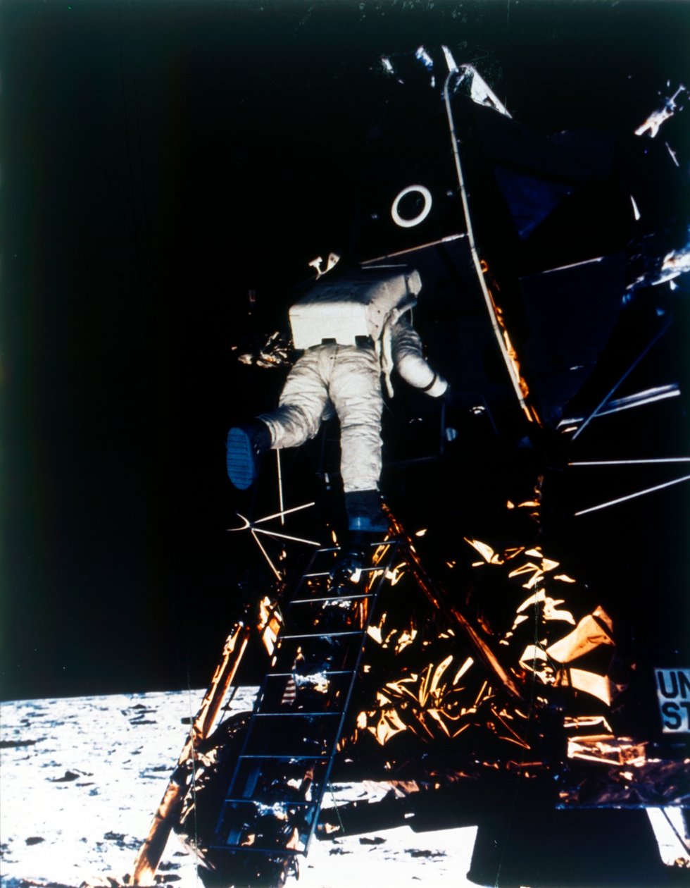 Buzz Aldrin descends from the Lunar Module, Apollo II mission by Neil Armstrong