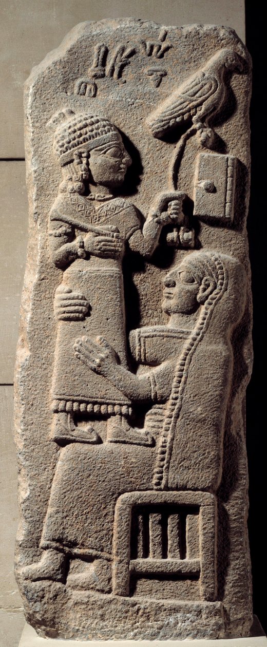 Low basalt relief depicting the scribe Tarhunpiyas on his mother
