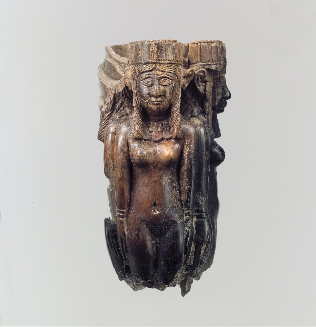 Fan or fly-whisk handle in the form of four female figures, c.8th-7th century B.C. (ivory) by Neo Assyrian