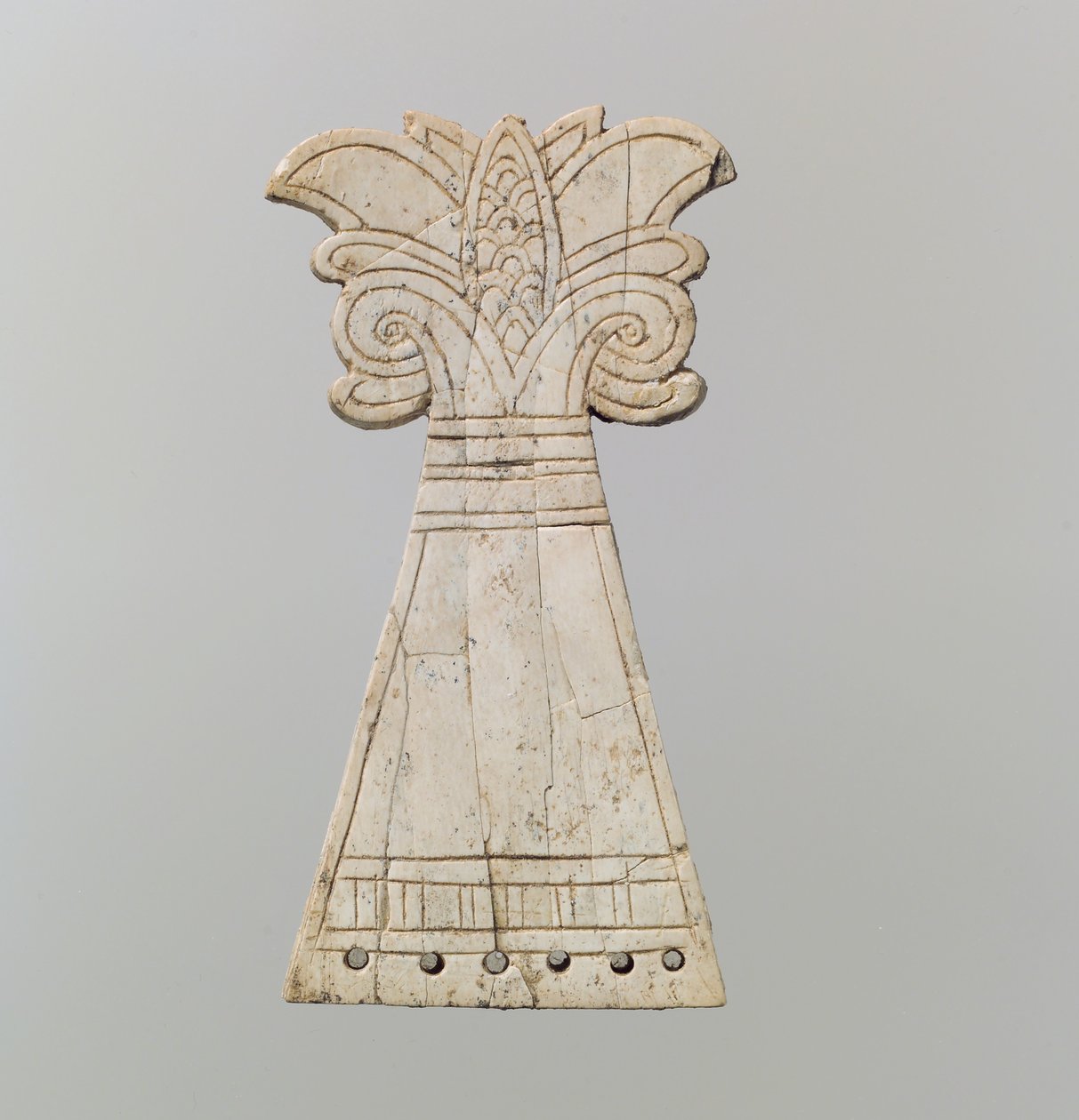 Incised Horse Frontlet Carved into the Shape of a Flowering, Volute Palmette Tree by Neo Assyrian