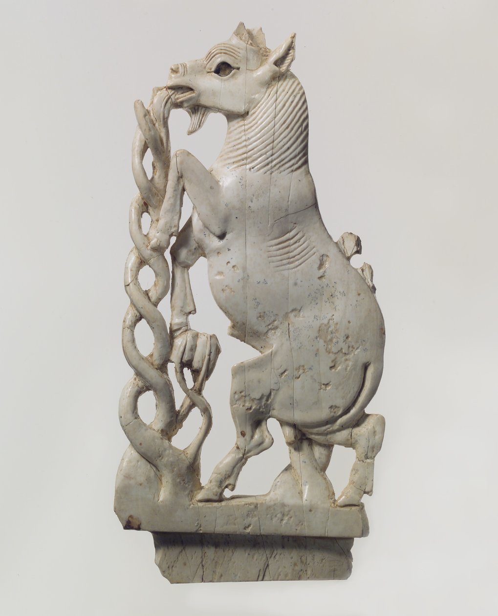 Openwork furniture plaque with a rearing goat, c.9th-8th century B.C. by Neo Assyrian