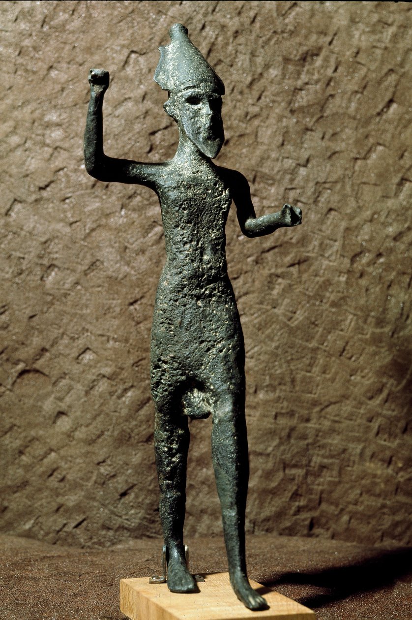 Phoenicia: figurine of a god in bronze. Found in the sea near Selinunte, Sicily. 14th-13th century BC by Phoenician