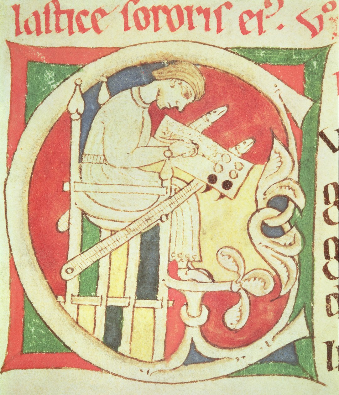 Historiated initial C depicting a monk writing, from Vitae Sanctorum ...