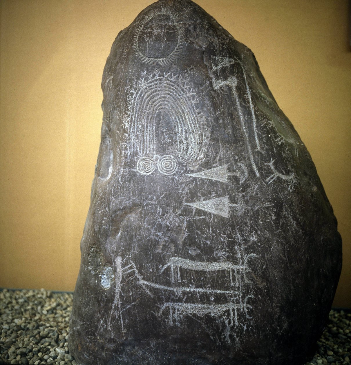 Civilization of the Camunni, Prehistory, rock art: grave rock, animals, arrow tips and spirals - Stele of Bagnolo type 2 in Valcamonica (Camonica Valley), Italy by Prehistoric Prehistoric