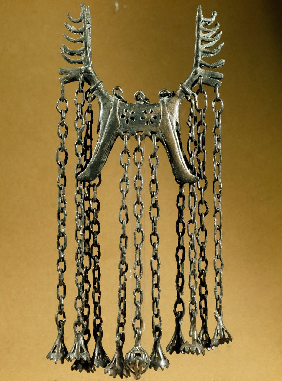 Elk shaped pendant with two heads from a site in Dolanlar. Bronze Age. Azerbaijan State Religion History Museum, Baku by Prehistoric Prehistoric