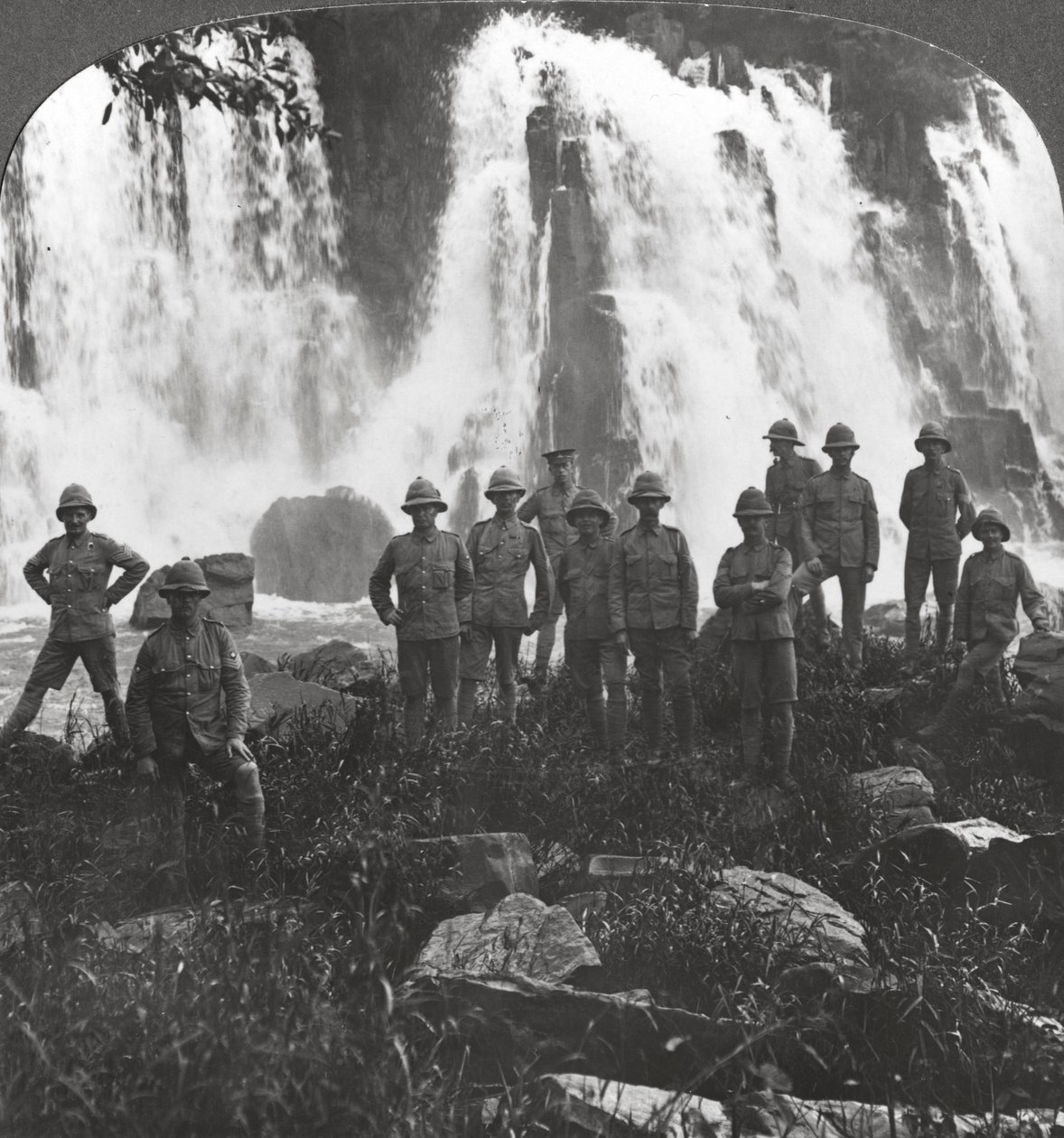 British Troops Refreshing Themselves at a Waterfall, Africa, World War I, c1914-c1918 by Realistic Travels Publishers