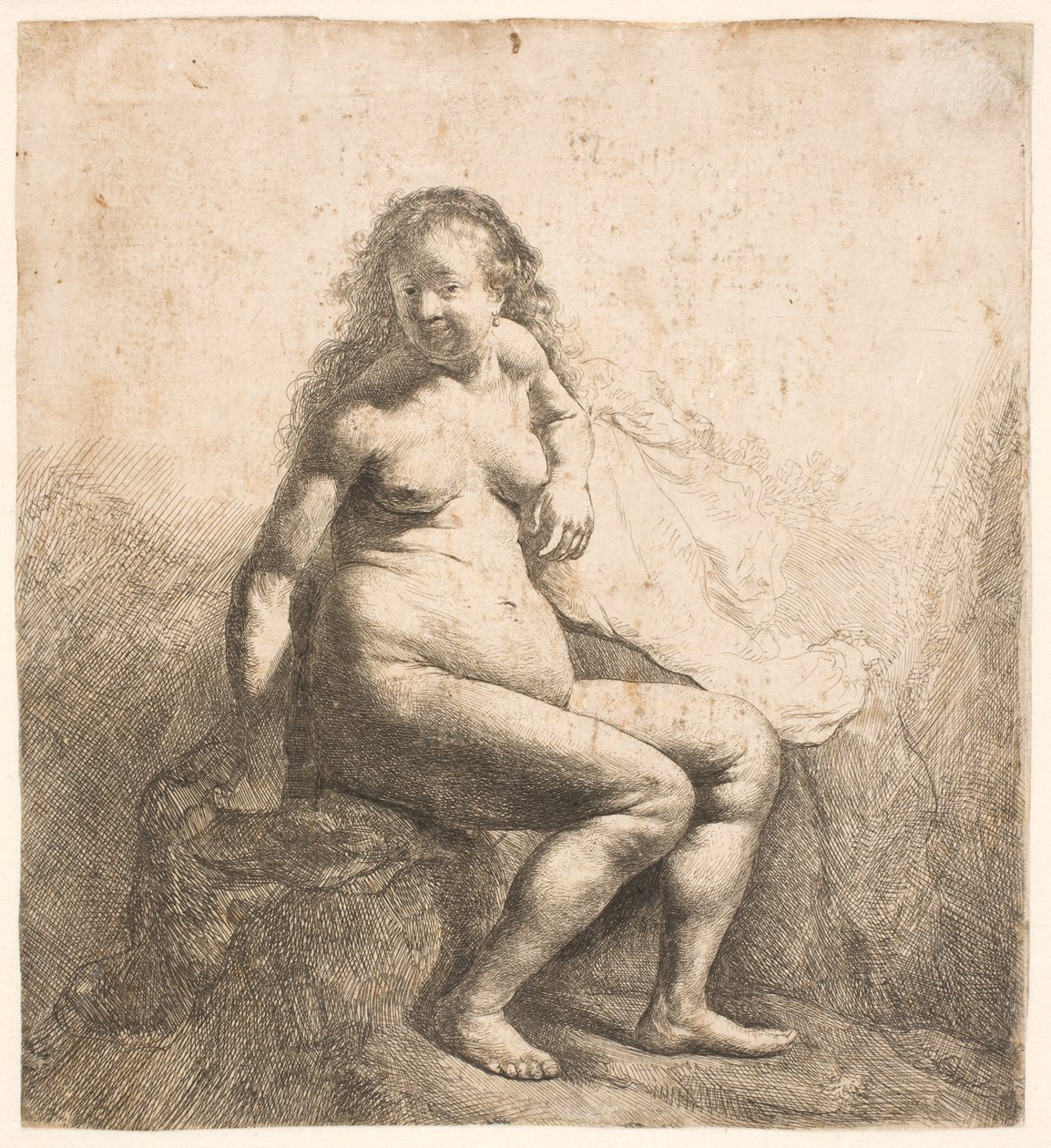 Naked Woman Seated on a Mound by Rembrandt van Rijn