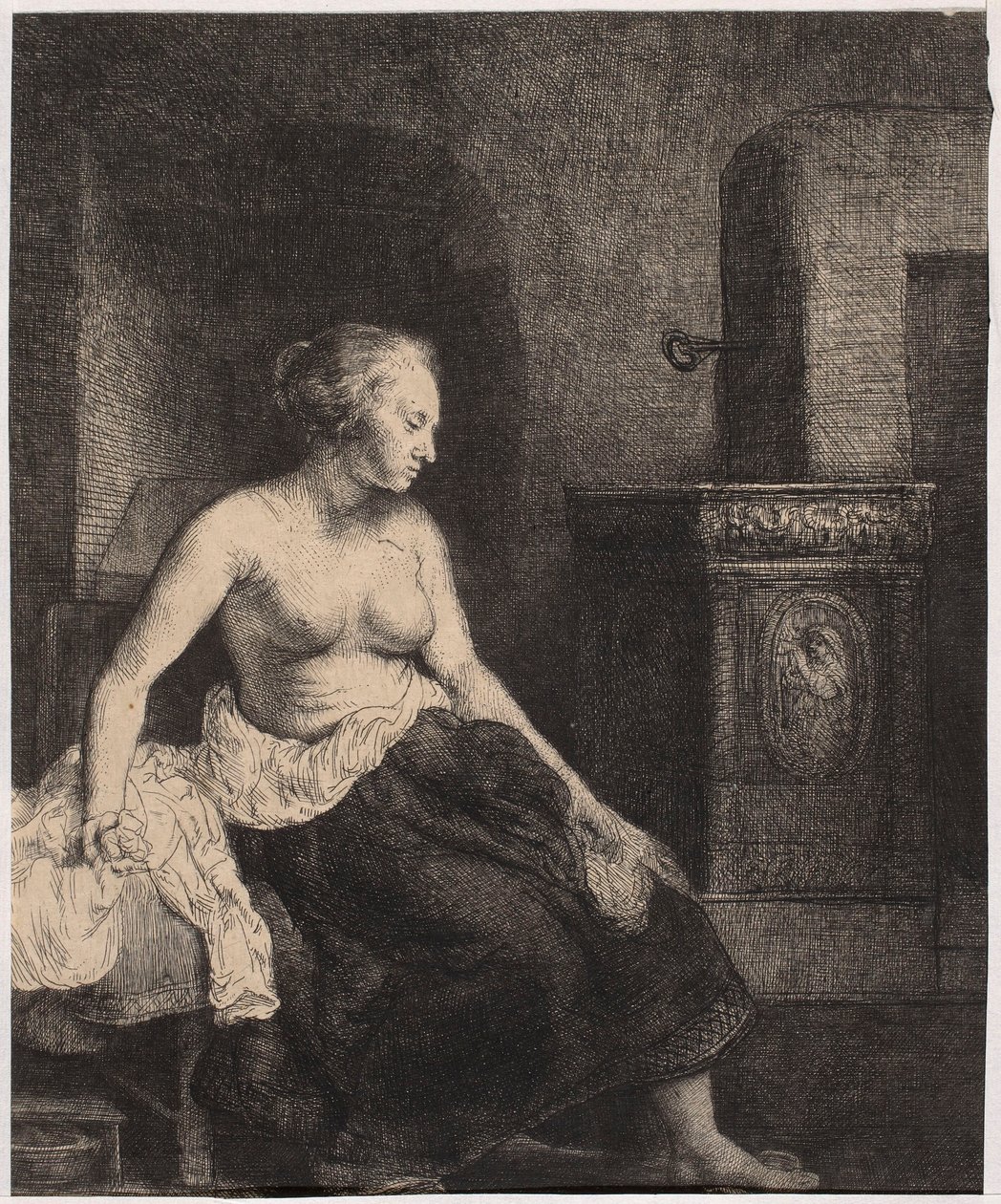 Half-Naked Woman Sitting by the Stove by Rembrandt van Rijn