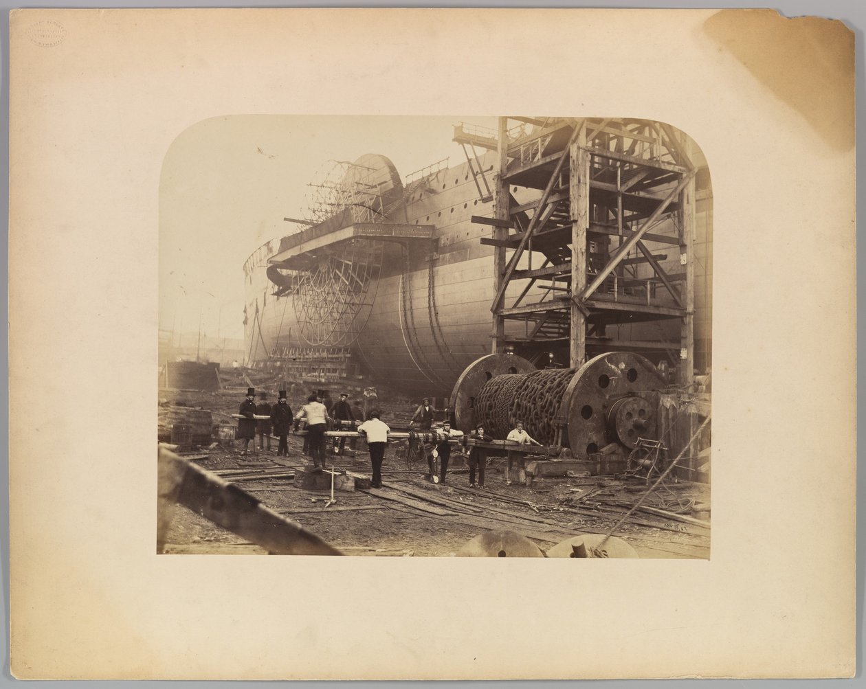Men at Work Beside the Launching Chains of the 