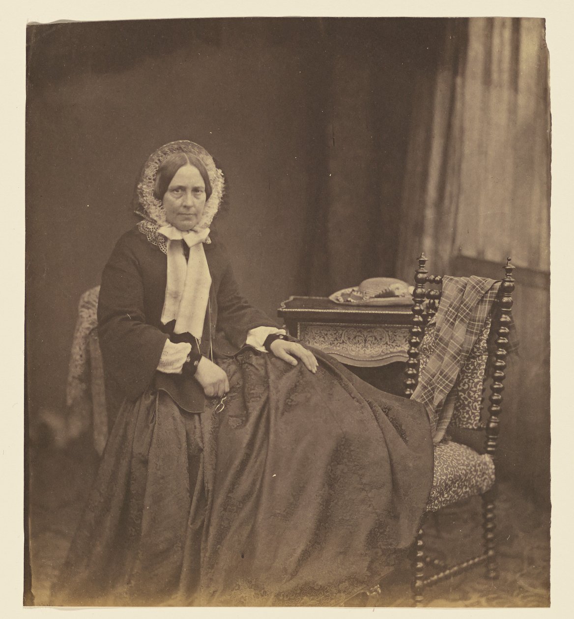 Portrait of a Woman, Wearing a Bonnet, Seated by Roger Fenton