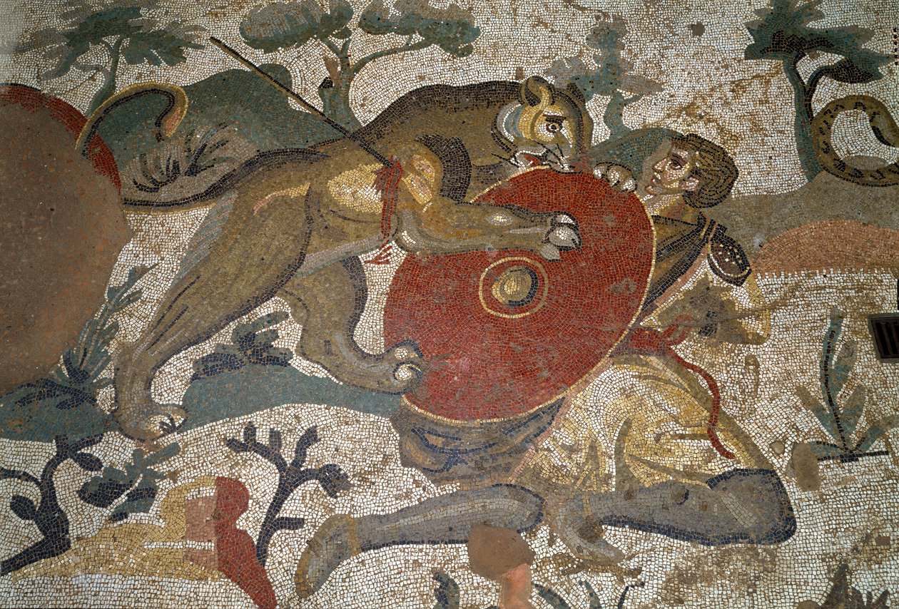 Roman art: a hunter attacked by a lioness protects himself with his ...