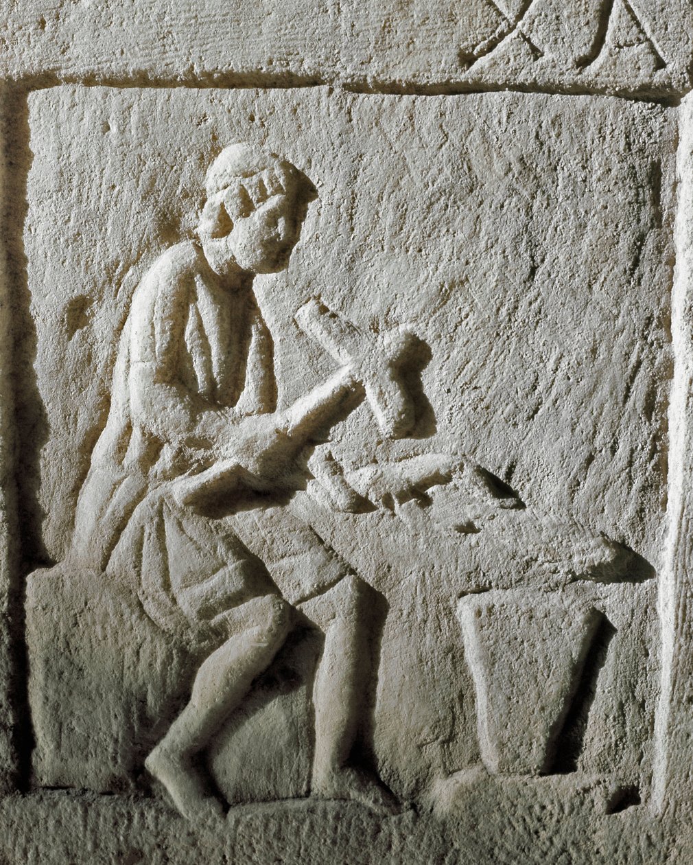 Roman Art: Detail of a Stele Depicting a Blacksmith Striking Metal on ...