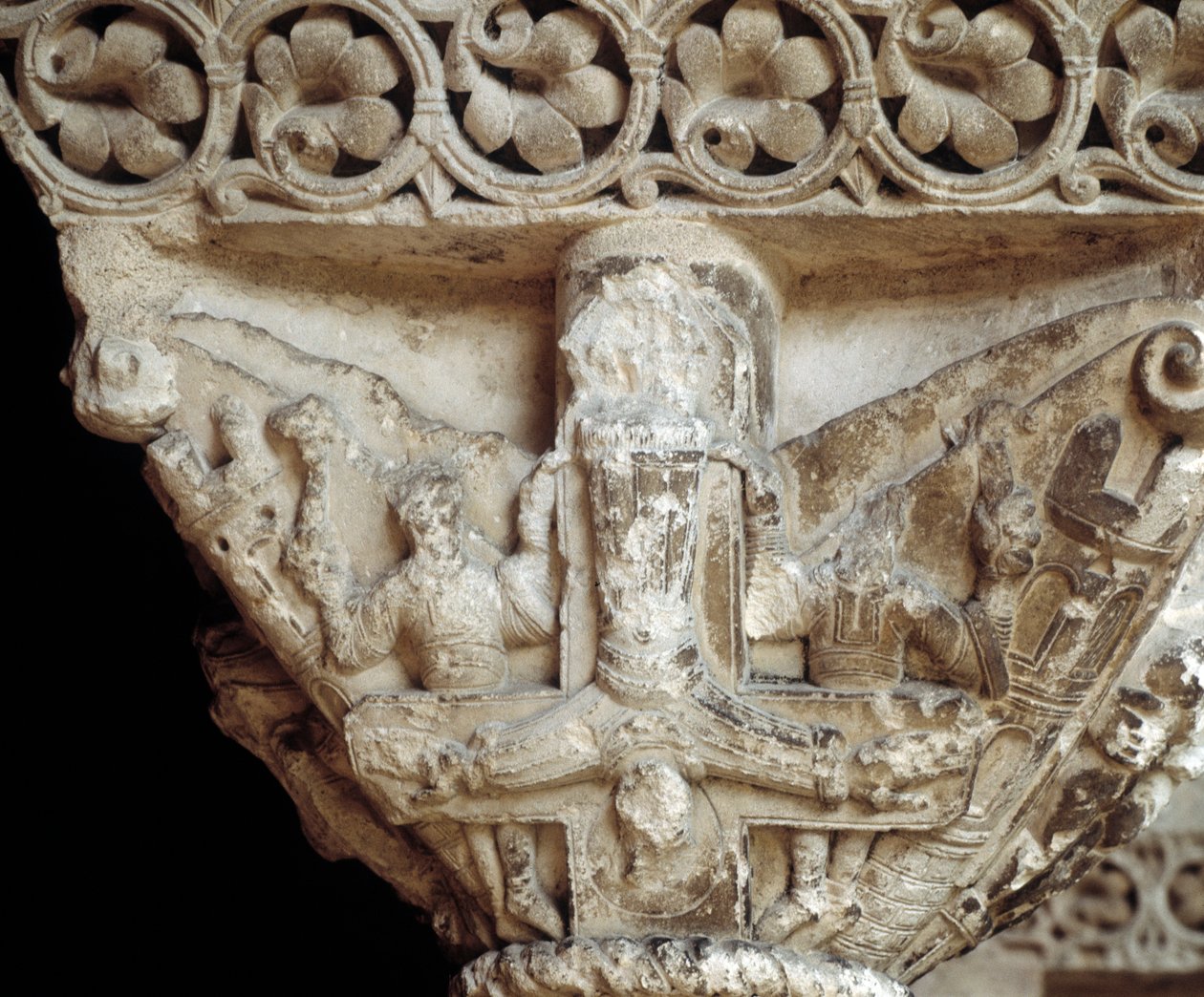 Capital representing St Peter on his cross (sculpture) by Romanesque