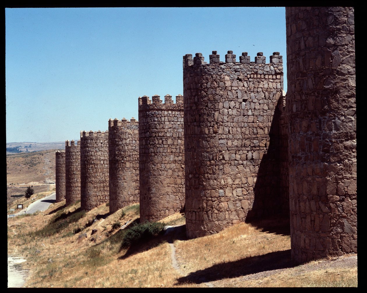 View of the walls of Avila, Spain by Romanesque
