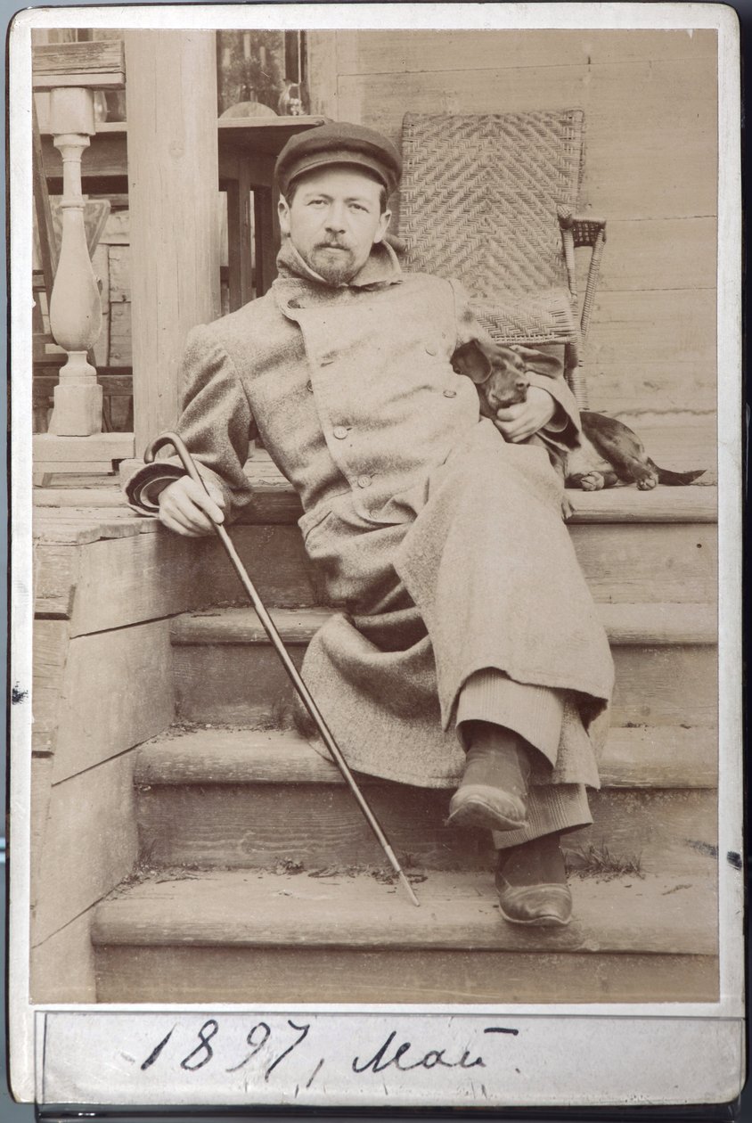 Portrait of Anton Chekhov with His Dog Hina in May 1897 at Melikhovo by Russian Photographer