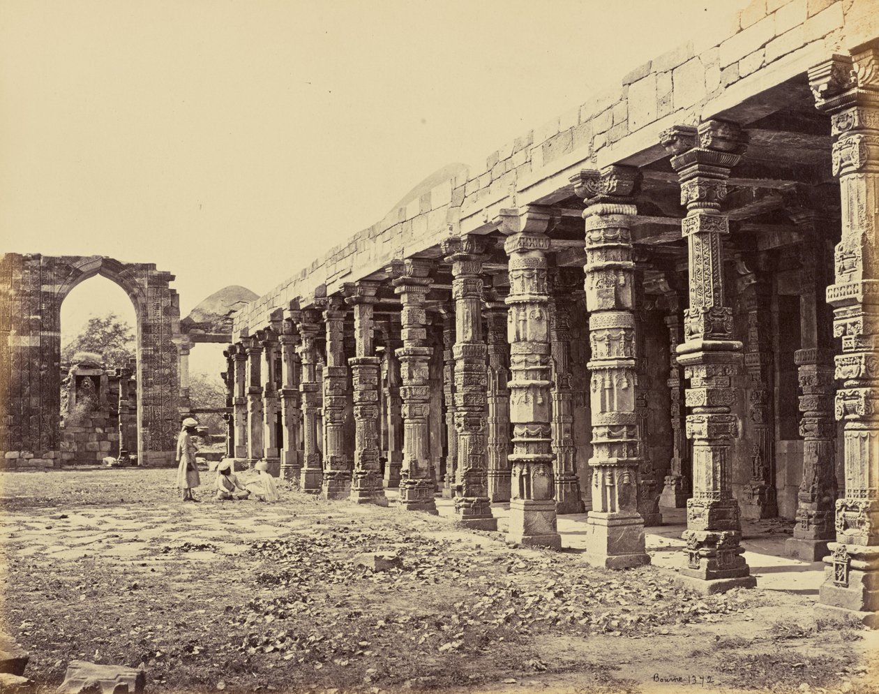 Delhi; Colonnade of Hindu Pillars, at the Qutub Minar, North Side by Samuel Bourne