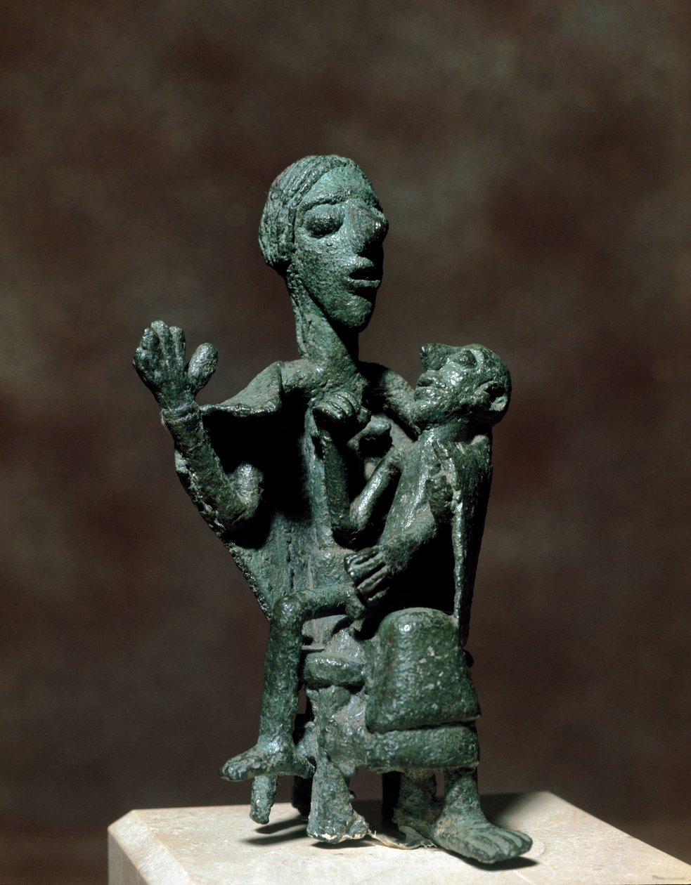 Bronze statuette of Mother Goddess with her son. 8th-7th