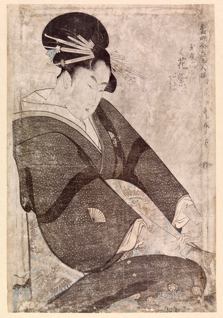 Seated Japanese woman by School Japanese