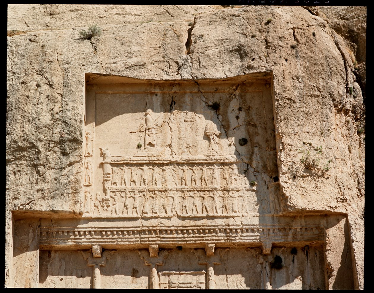 View of the Necropolis and the tomb of Darius I the Great with relief representing him honoring the sun by School Persian