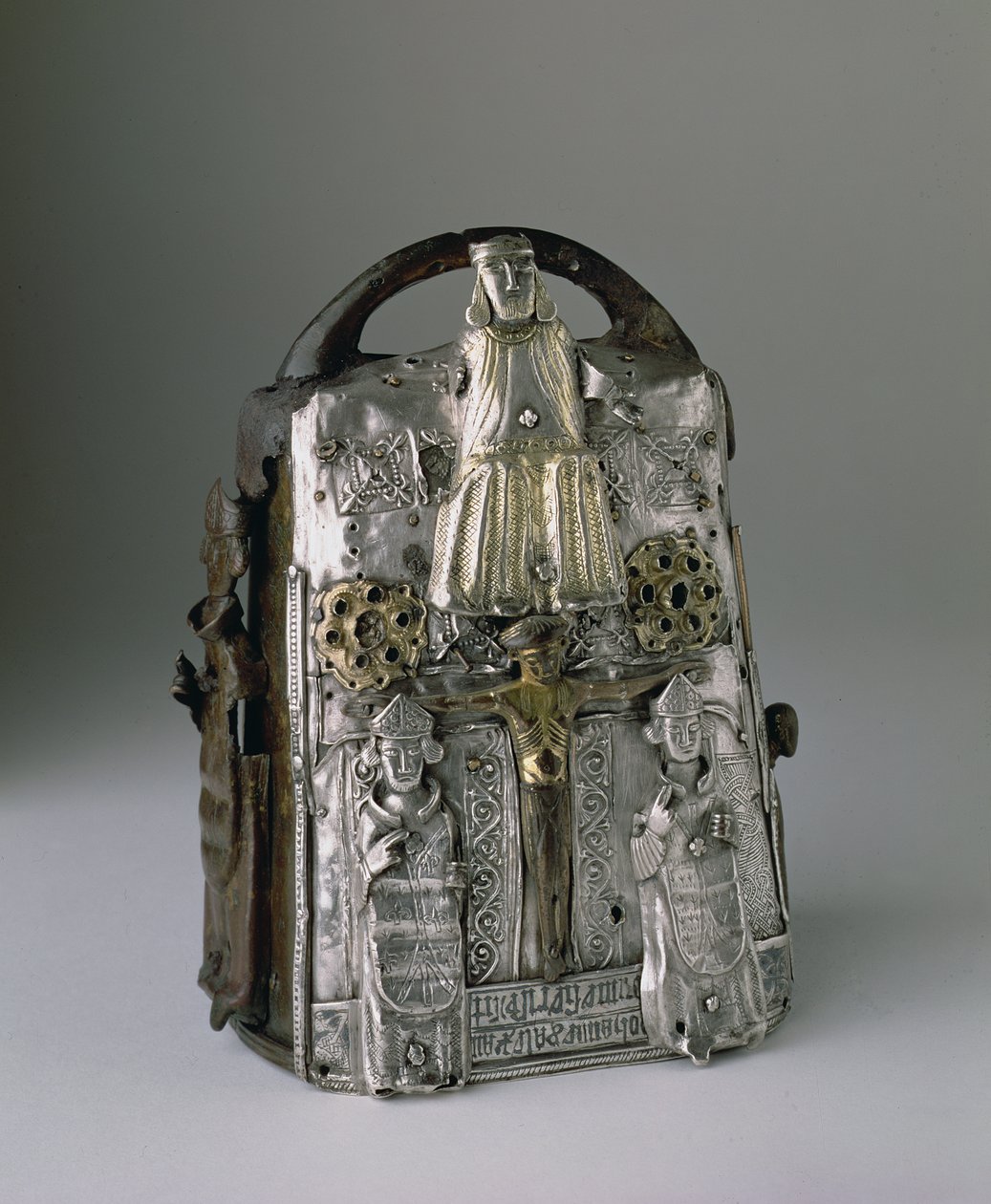Guthrie Bell Shrine, bearing representations of God and the Crucifixion, an inscription in Latin, kept at Guthrie Castle, Forfarshire by Scottish School