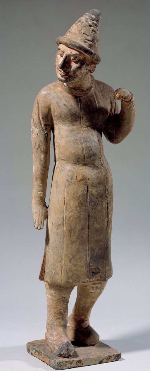 Chinese art: Sogdian, barbarian terracotta statuette with pointed hat carrying silk by Sogdian Sogdian