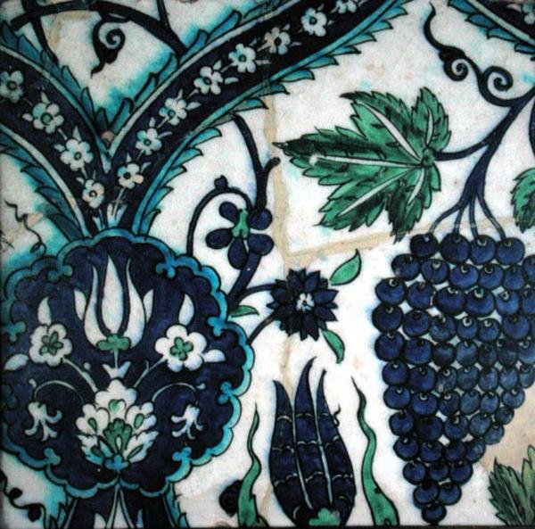 Isnik tile with flowers and a bunch of grapes