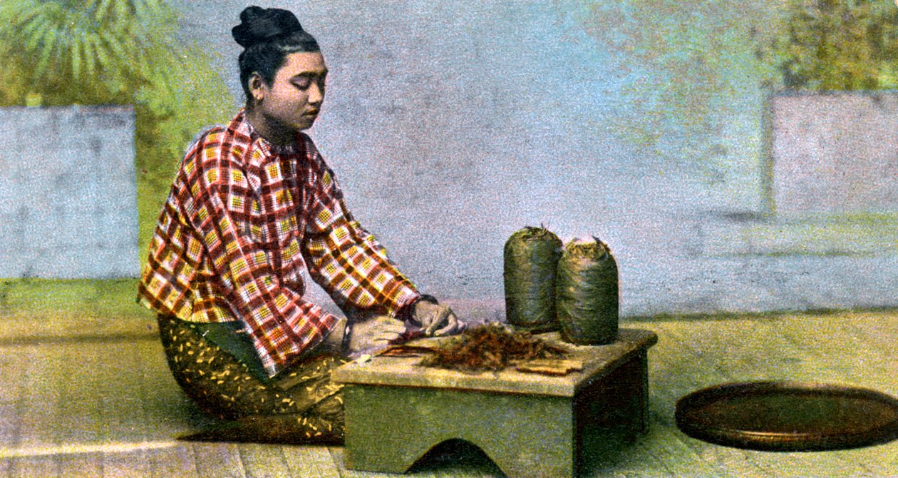 A Burmese Woman Making Cigars, c1900s by Unbekannt