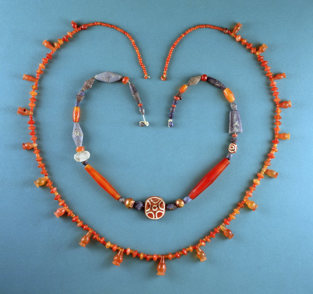 Cornelian Necklace from Tell Farah (South), Israel, c.1300 BC; Lapis Lazuli, Cornelian and Etched Cornelian Necklace from Kish, Iraq, c.2500 BC by Unbekannt