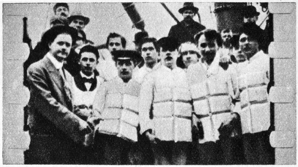 Members of the crew of the Titanic in their life jackets by Unbekannt
