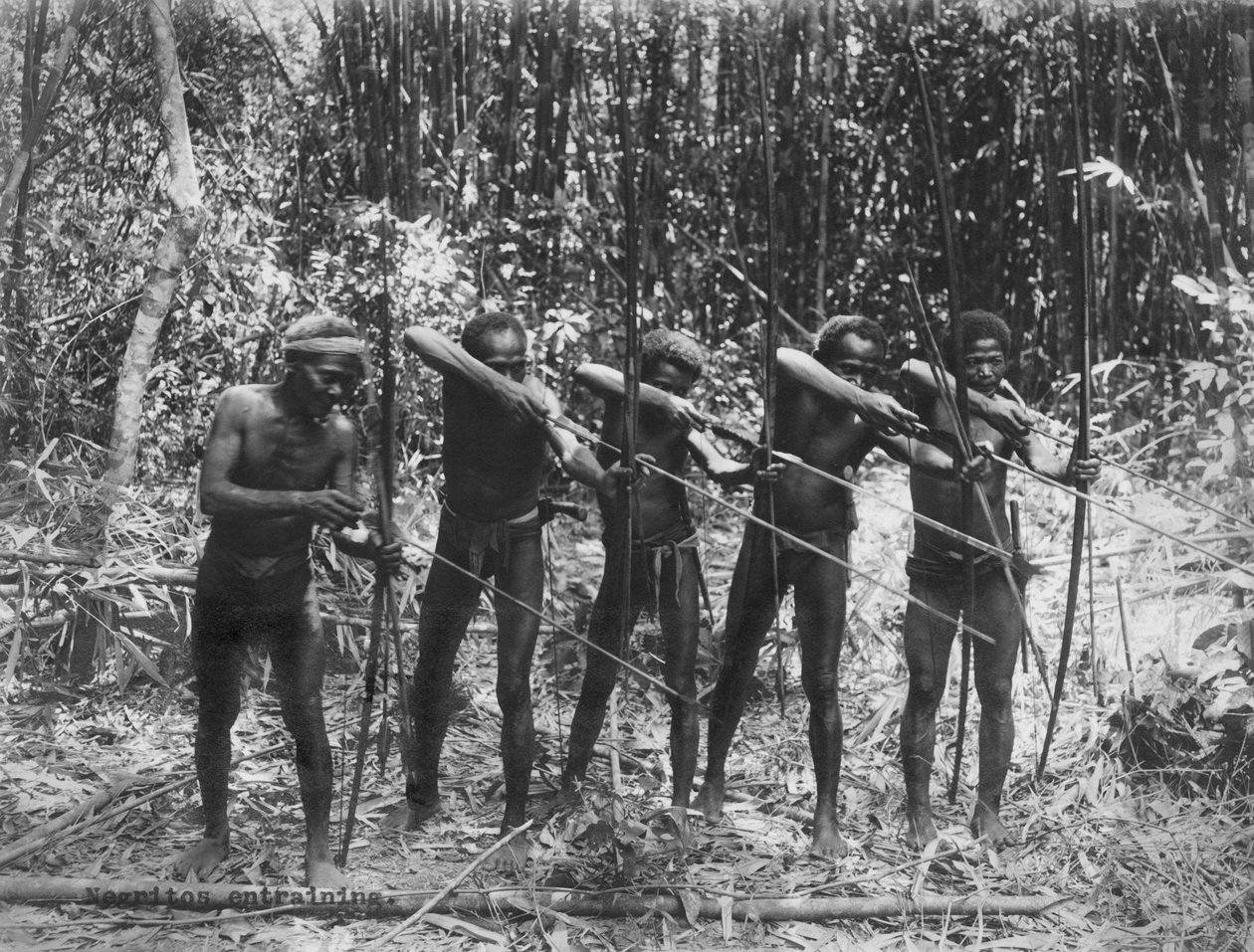 Philippines: c.1890 Male members of the Negrito tribe showing their hunting skills by Unbekannt