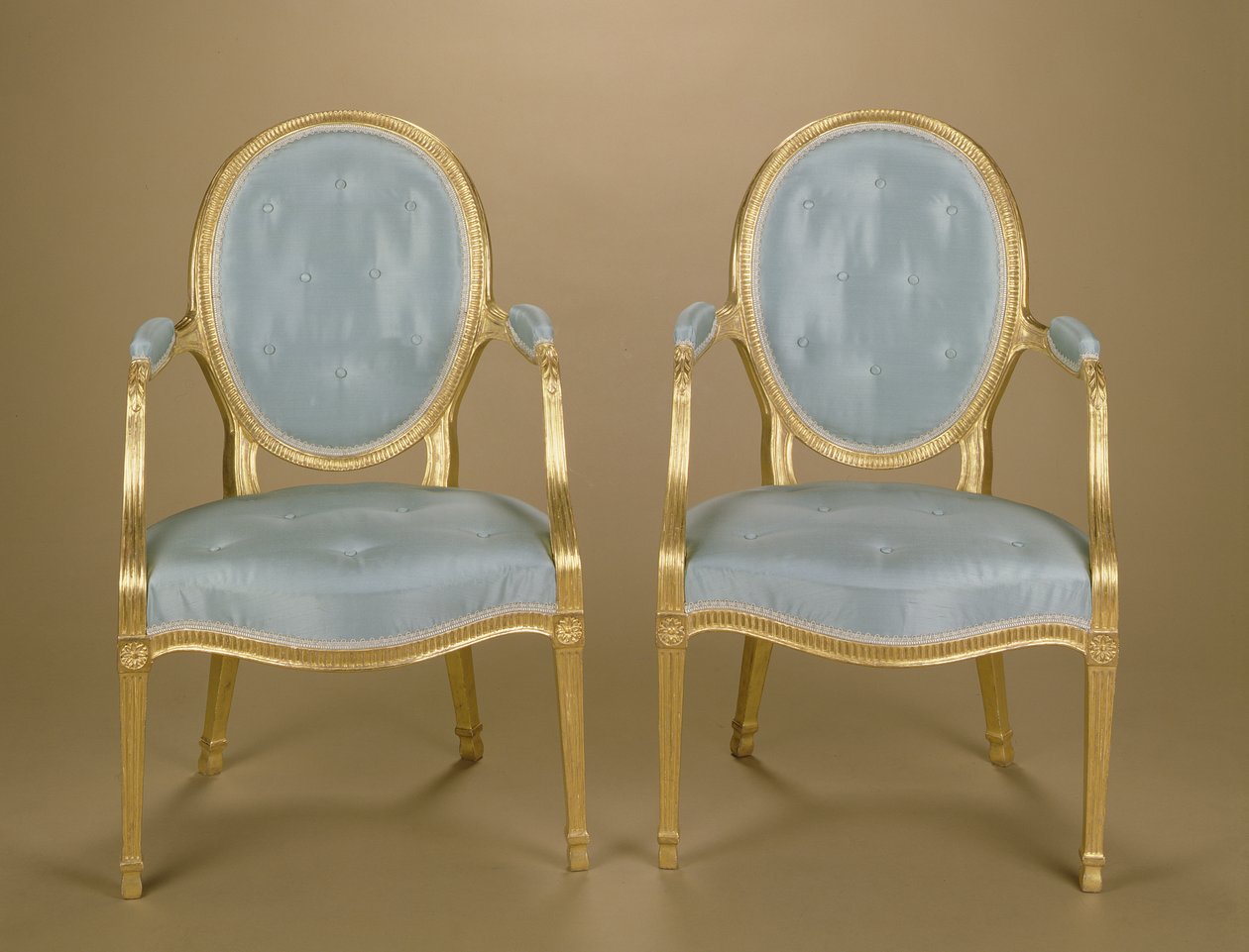 Pair of Adam oval-backed gilt carver chairs, blue upholstered, c.1780 by Unbekannt Unbekannt