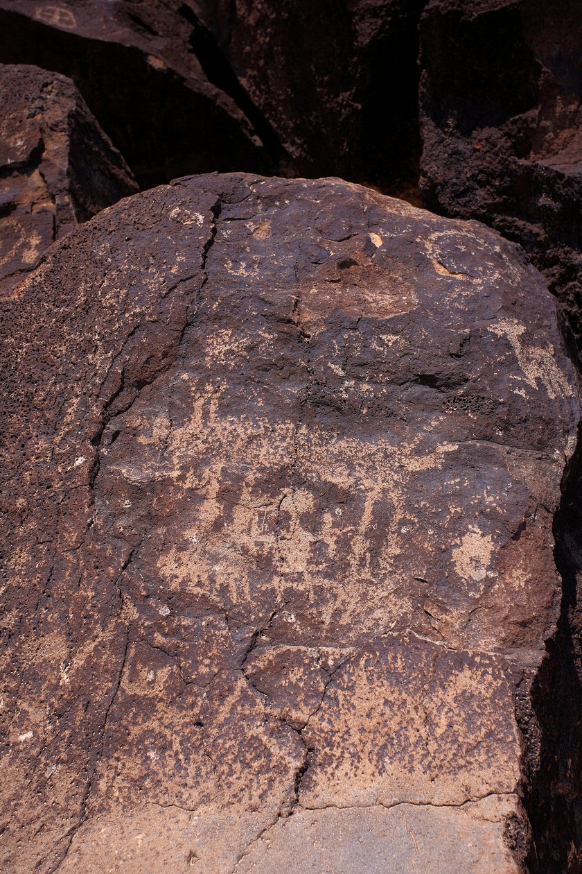 Petroglyphs depicting animals and characters - Petroglyph National Monument - Albuquerque, New Mexico, USA by William M. Timlin