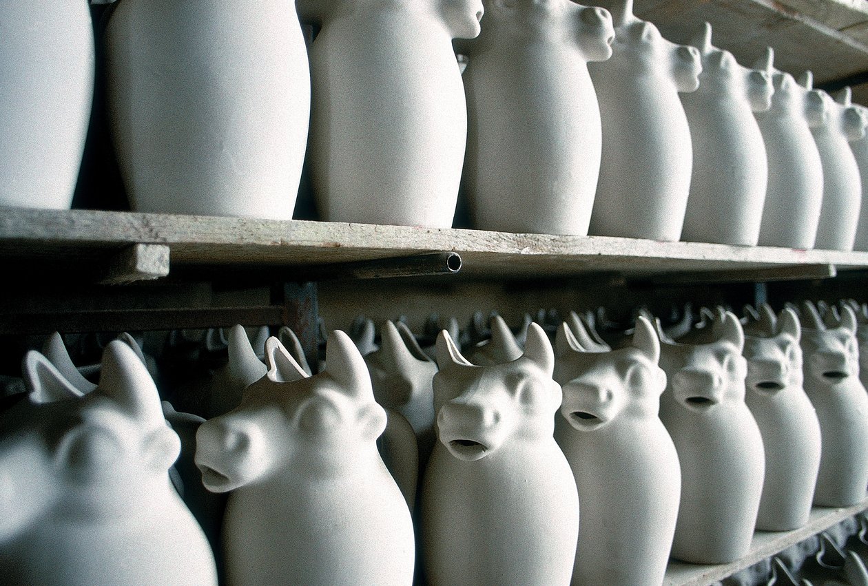 Shelves inside a ceramic factory with some milk jugs, Montelupo Fiorentino, Italy by Unbekannter Künstler