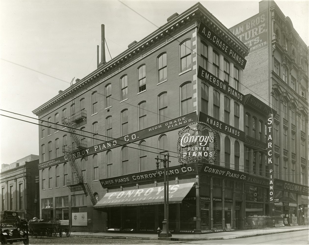 Conroy Piano Company, Southeast Corner of Eleventh and Olive Streets by Unknown