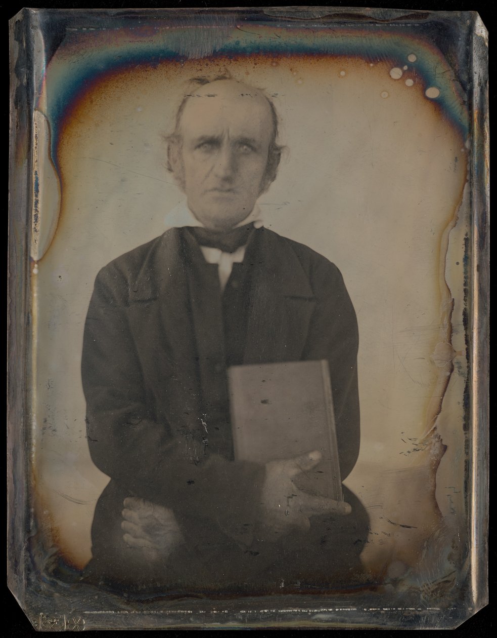 Portrait of a Man with Muttonchop Whiskers Clutching a Book by Unknown artist