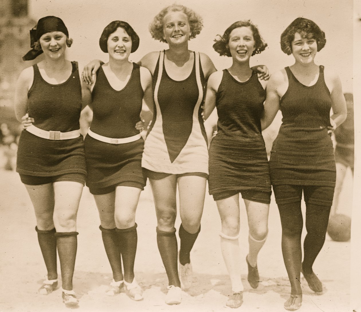 Beauties Arm in Arm on the Beach by Unknown photographer
